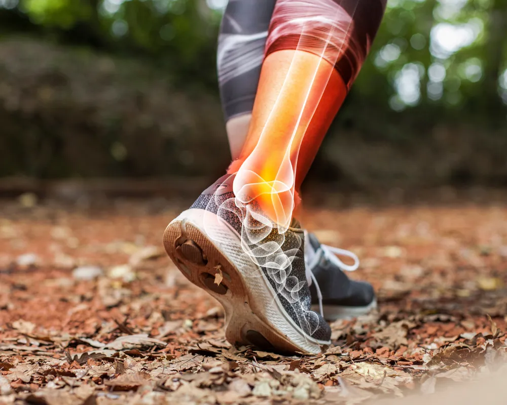 Sports injury — glowing ankle and lower leg pain while running